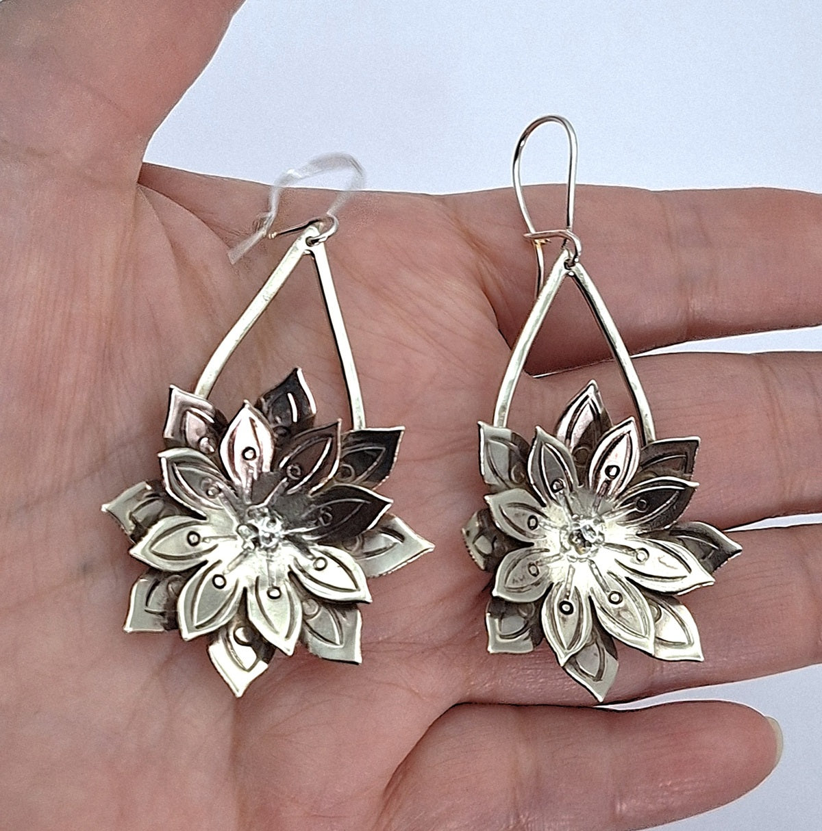 Aros flor de canelo largos alpaca