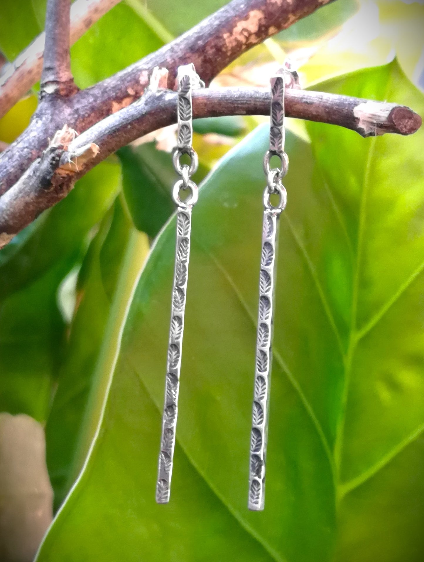 Aros largos plata hojitas