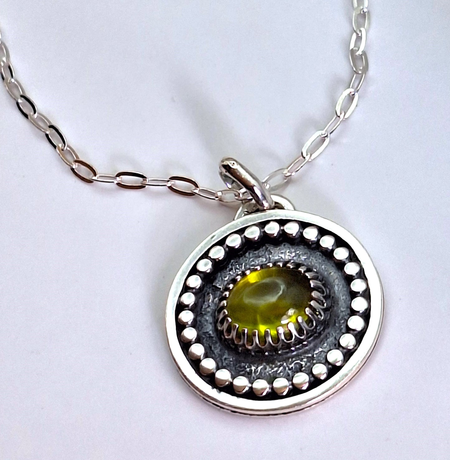 Colgante Peridoto reticulado y pelotitas