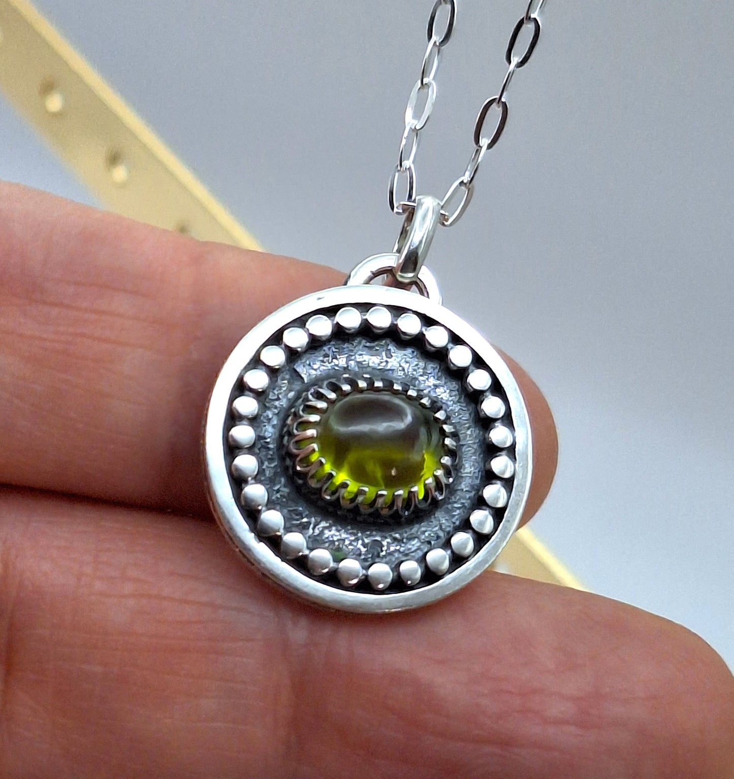 Colgante Peridoto reticulado y pelotitas