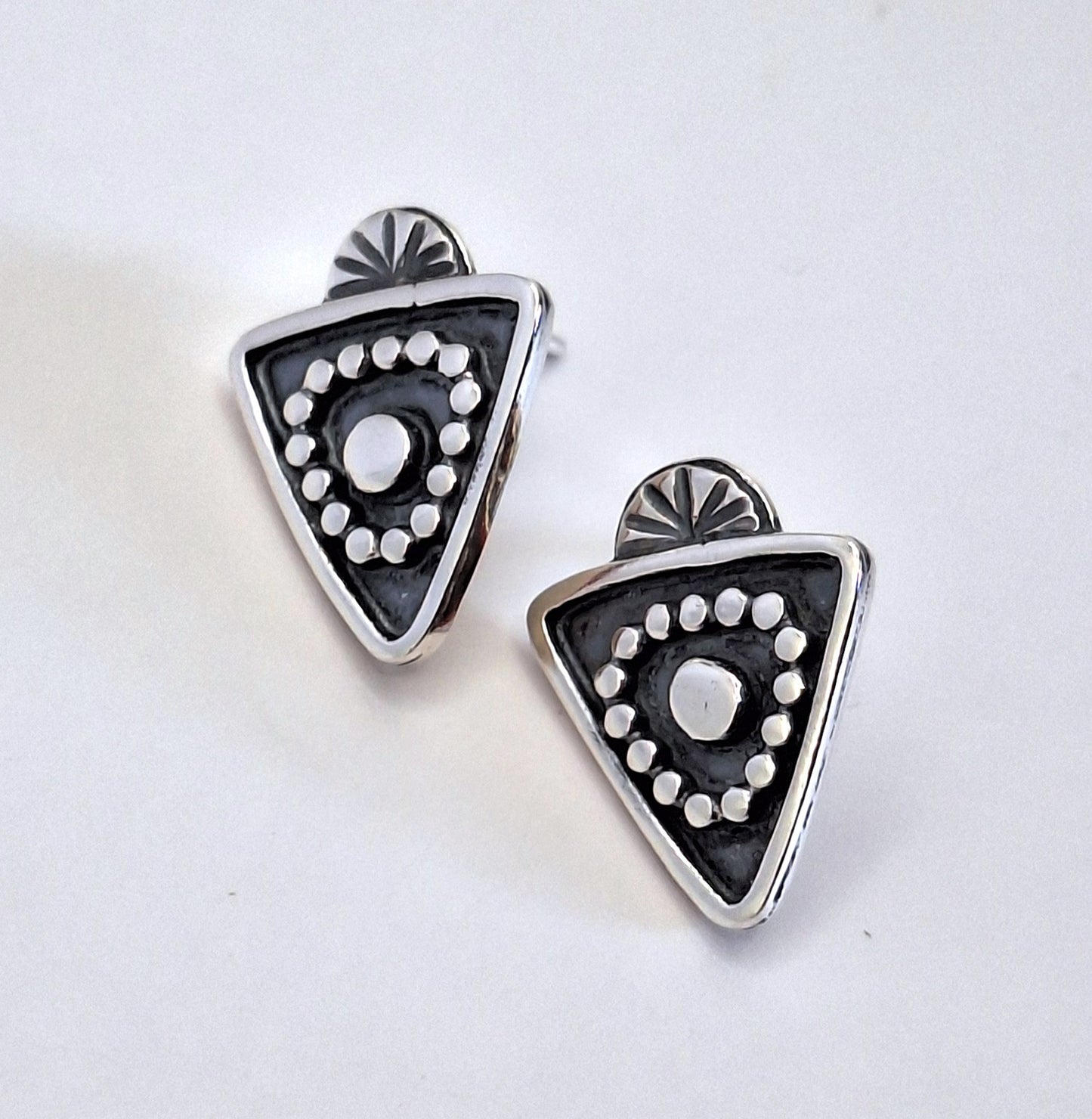 Aros triangulares pegados étnico