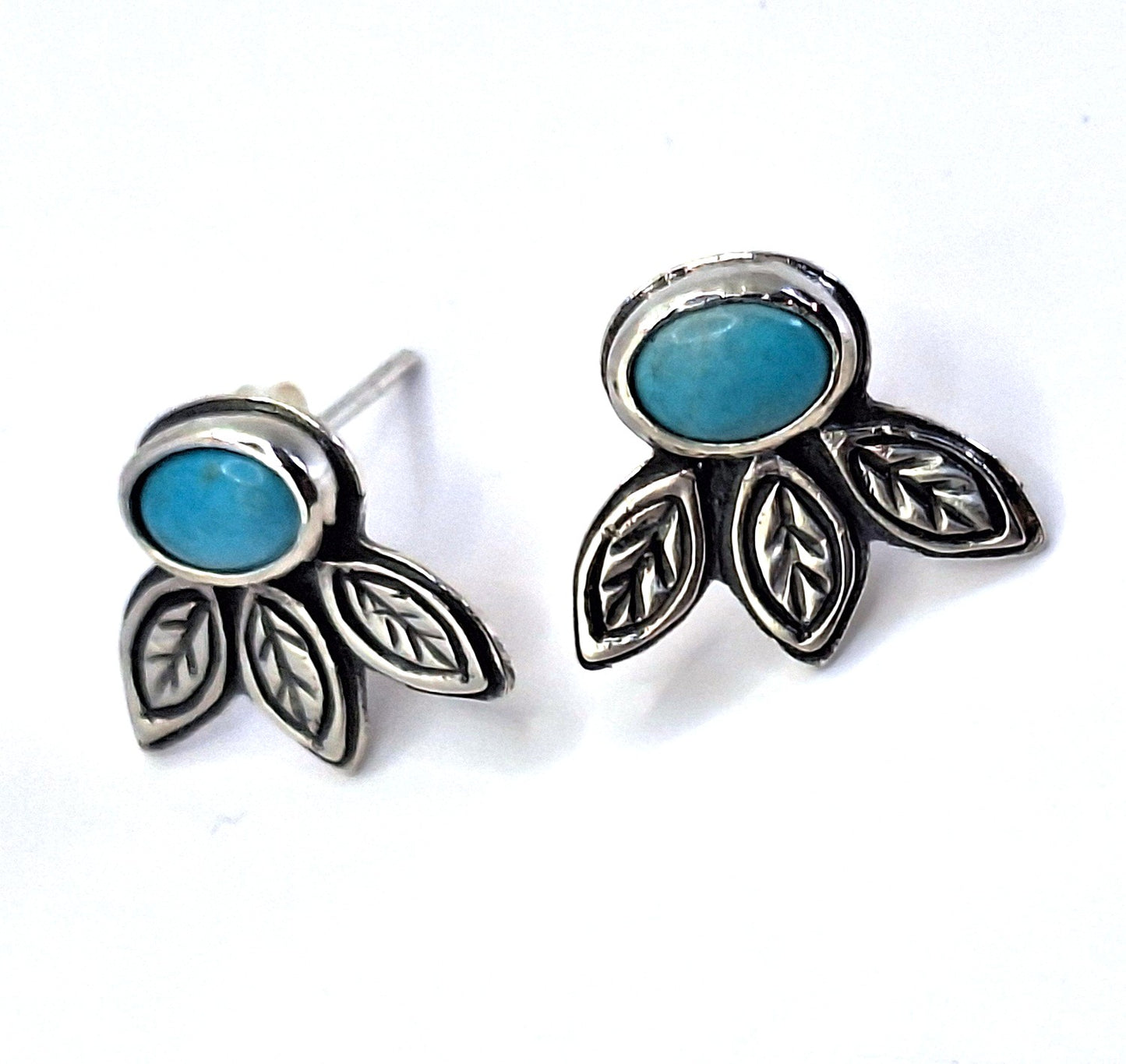Aros turquesa hojas pegados