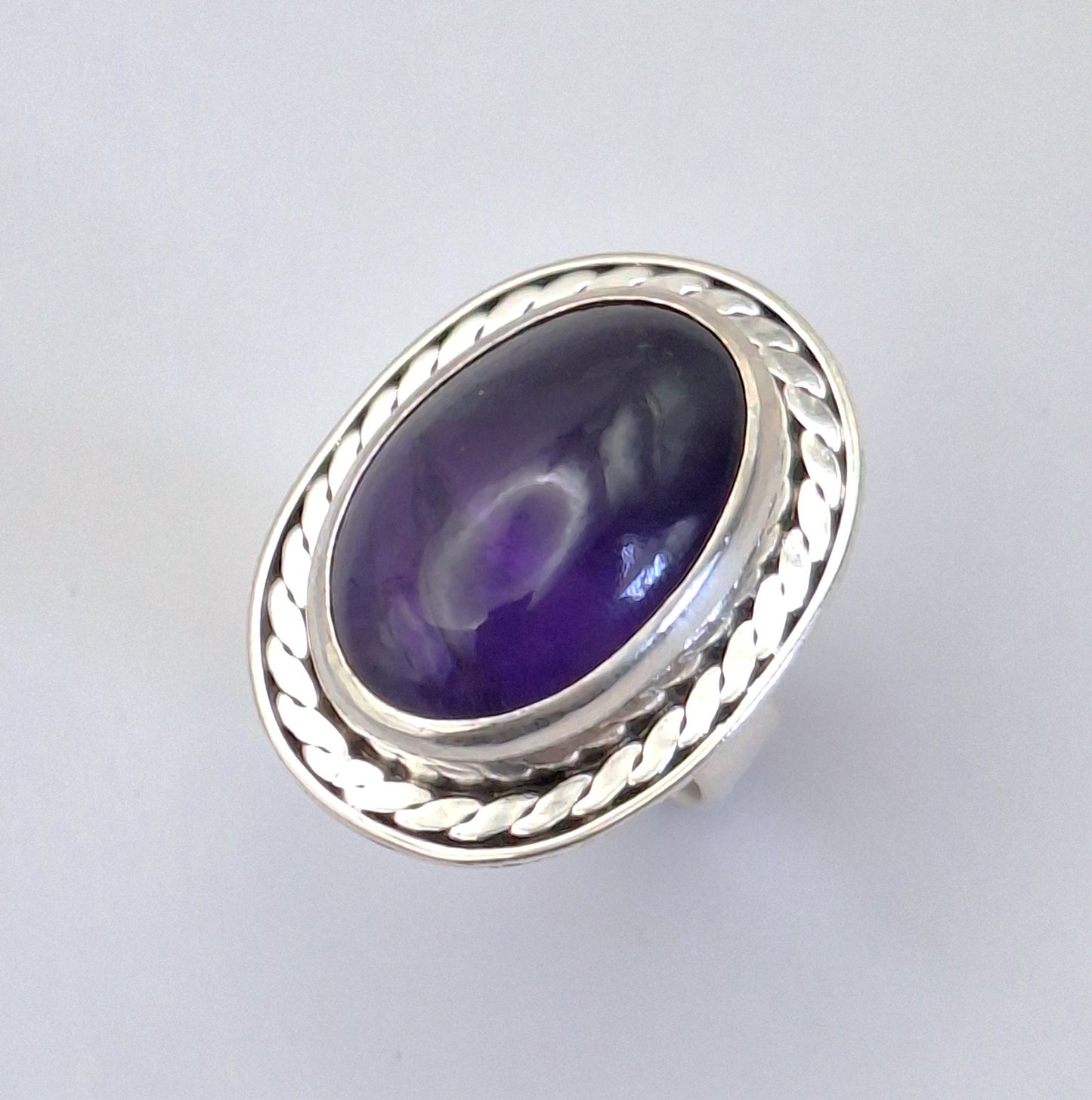 Anillo Amatista borde trenza