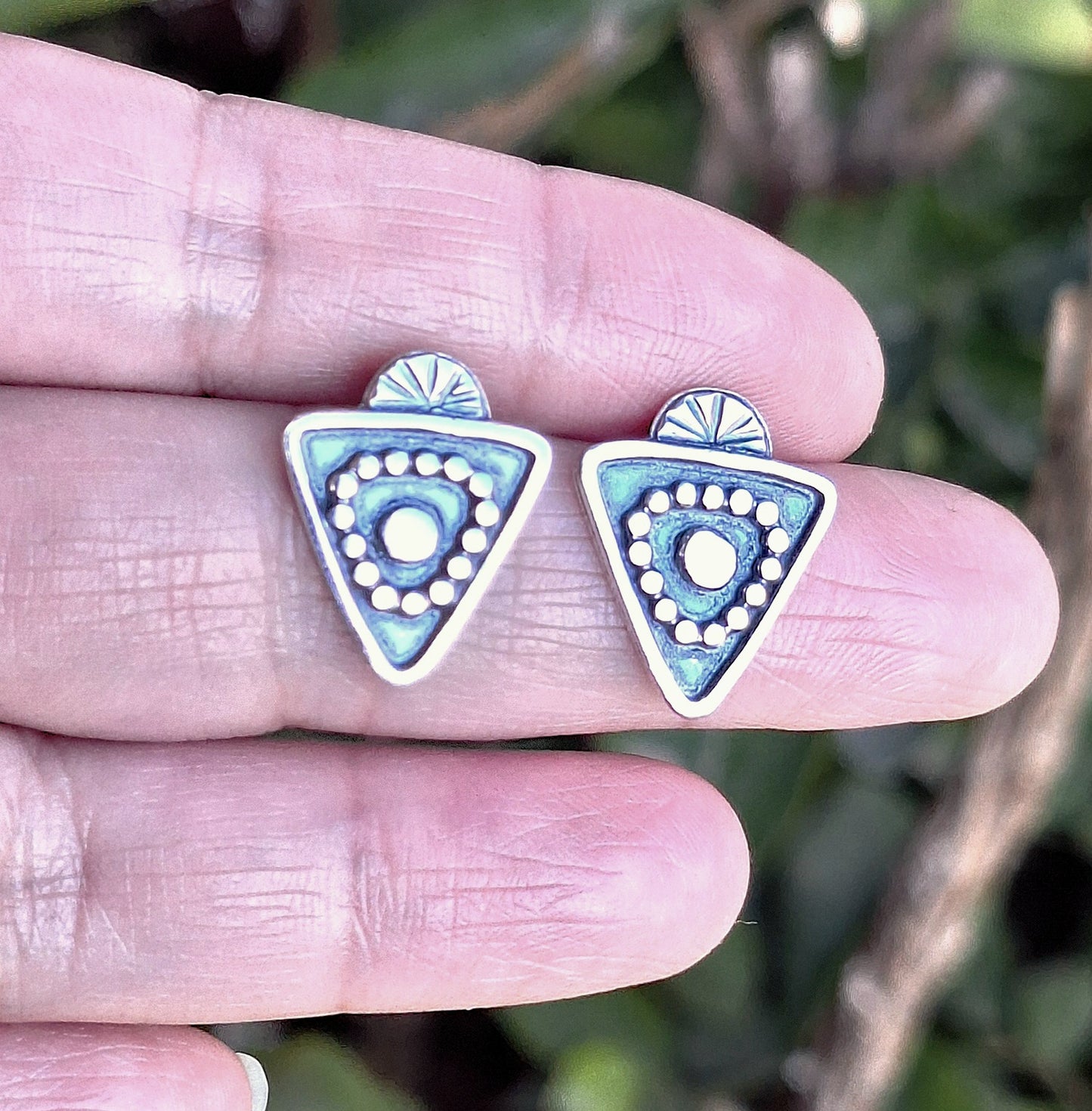 Aros triangulares pegados étnico