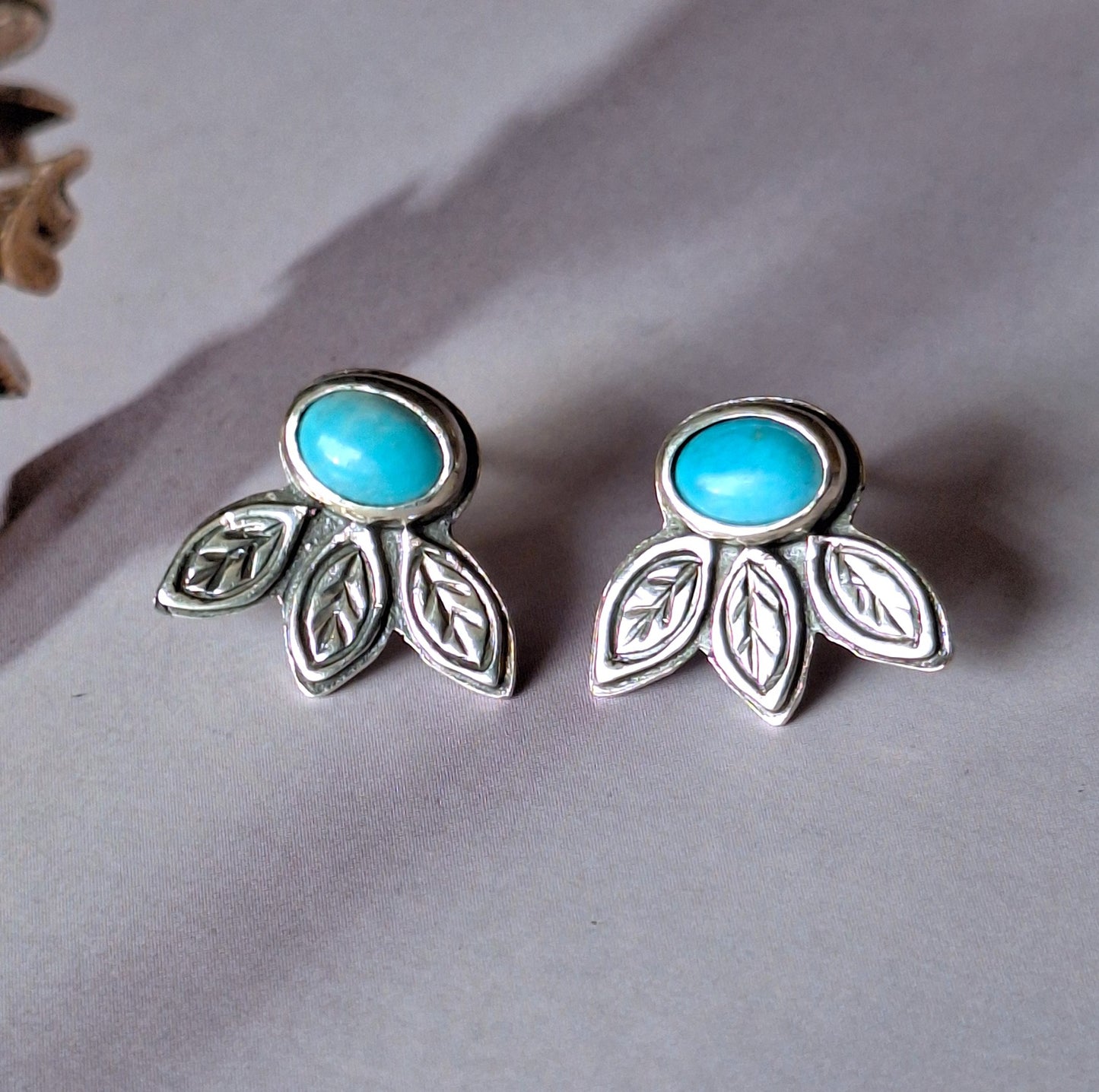 Aros turquesa hojas pegados