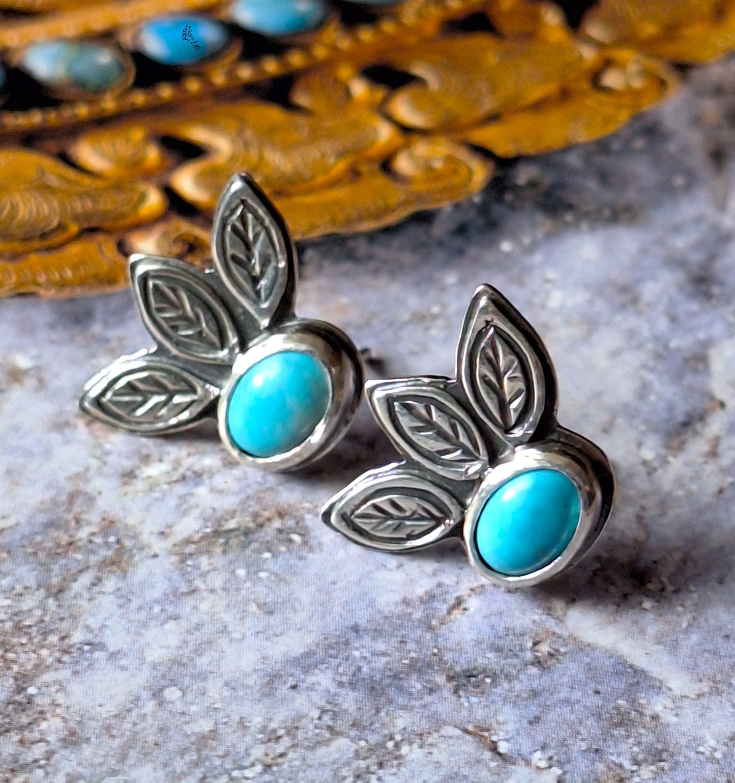 Aros turquesa hojas pegados