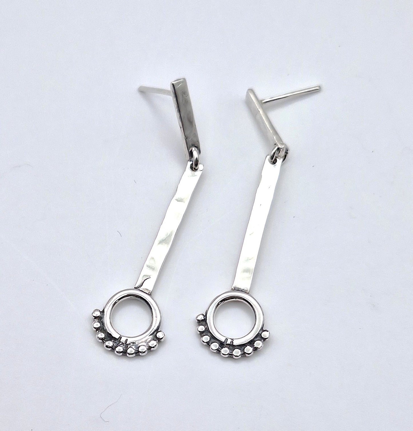 Aros palitos con círculo y pelotitas