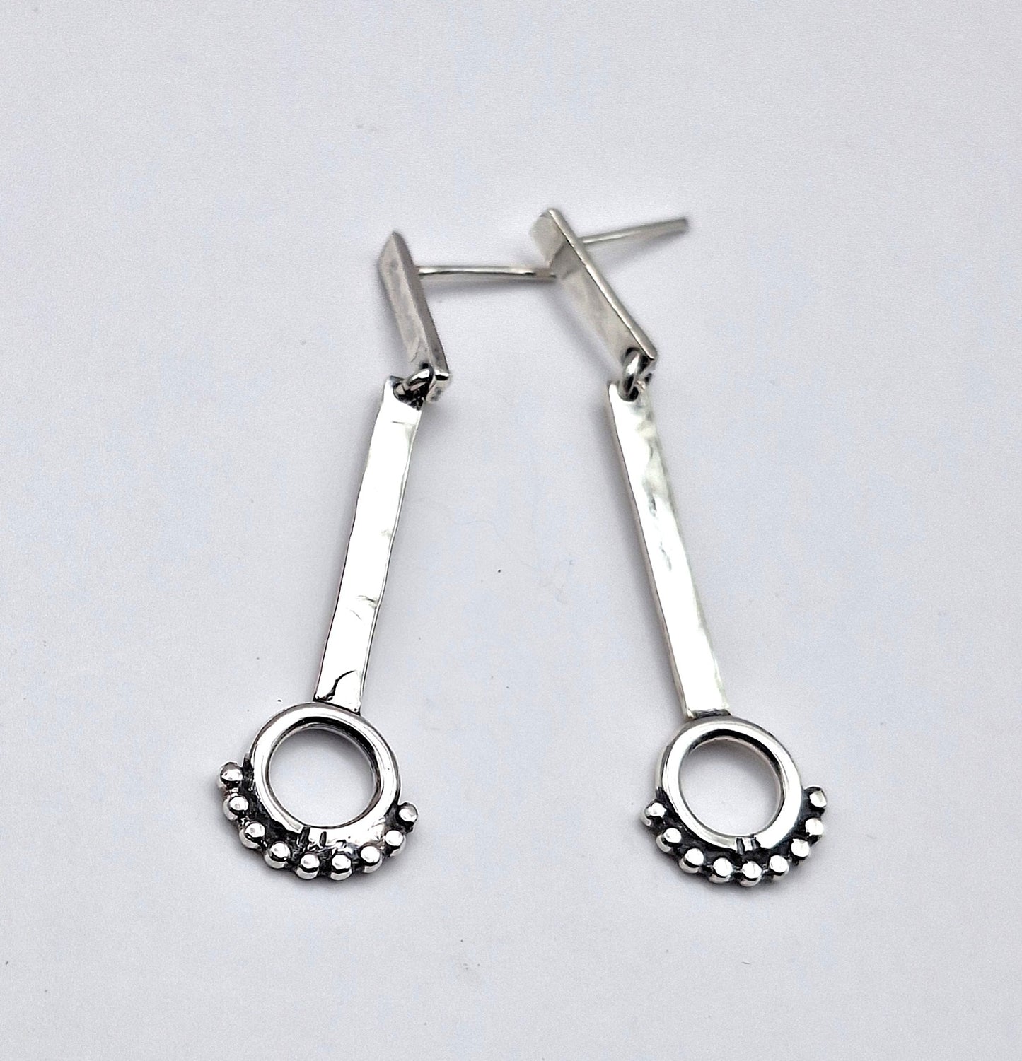 Aros palitos con círculo y pelotitas