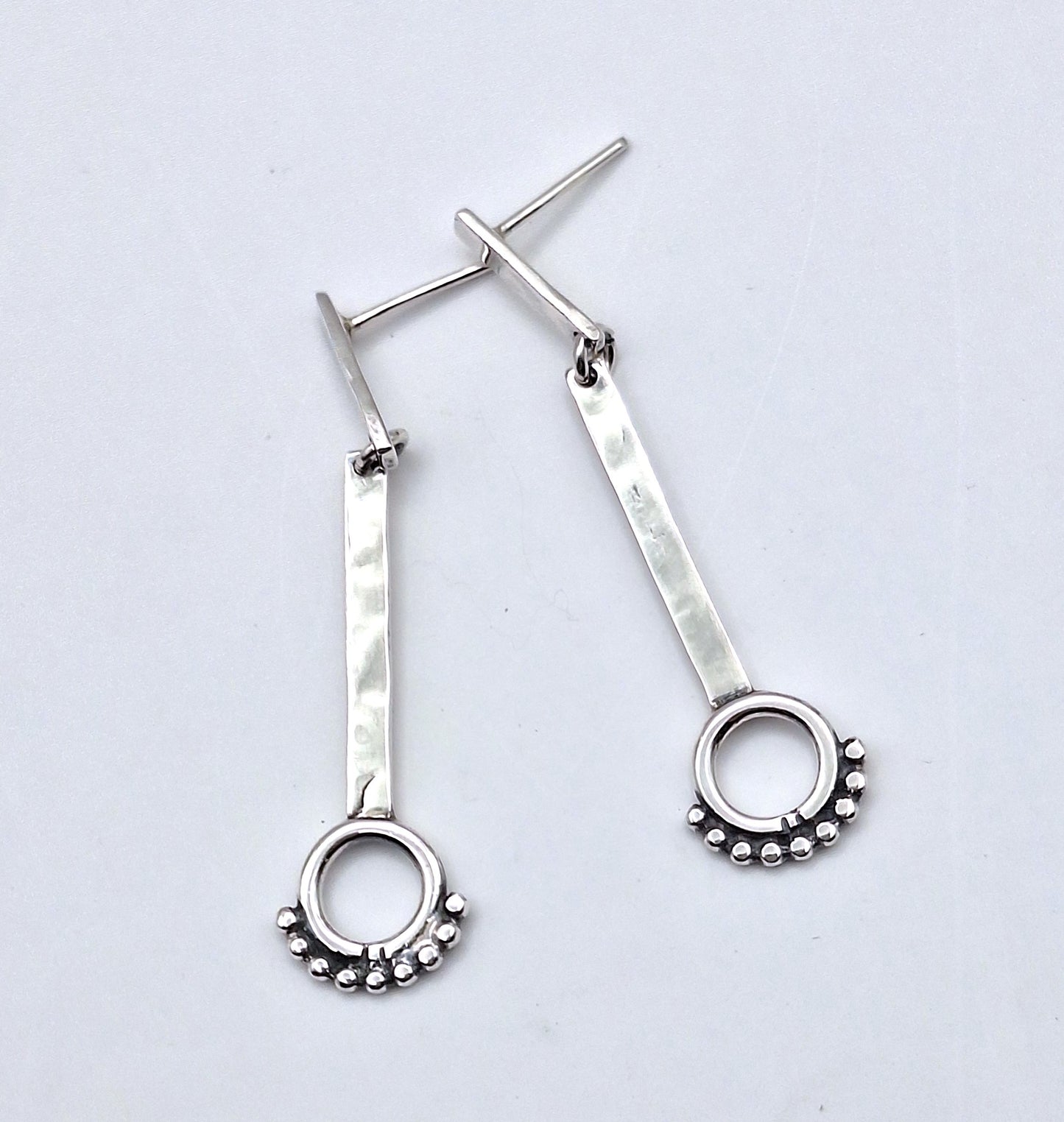 Aros palitos con círculo y pelotitas