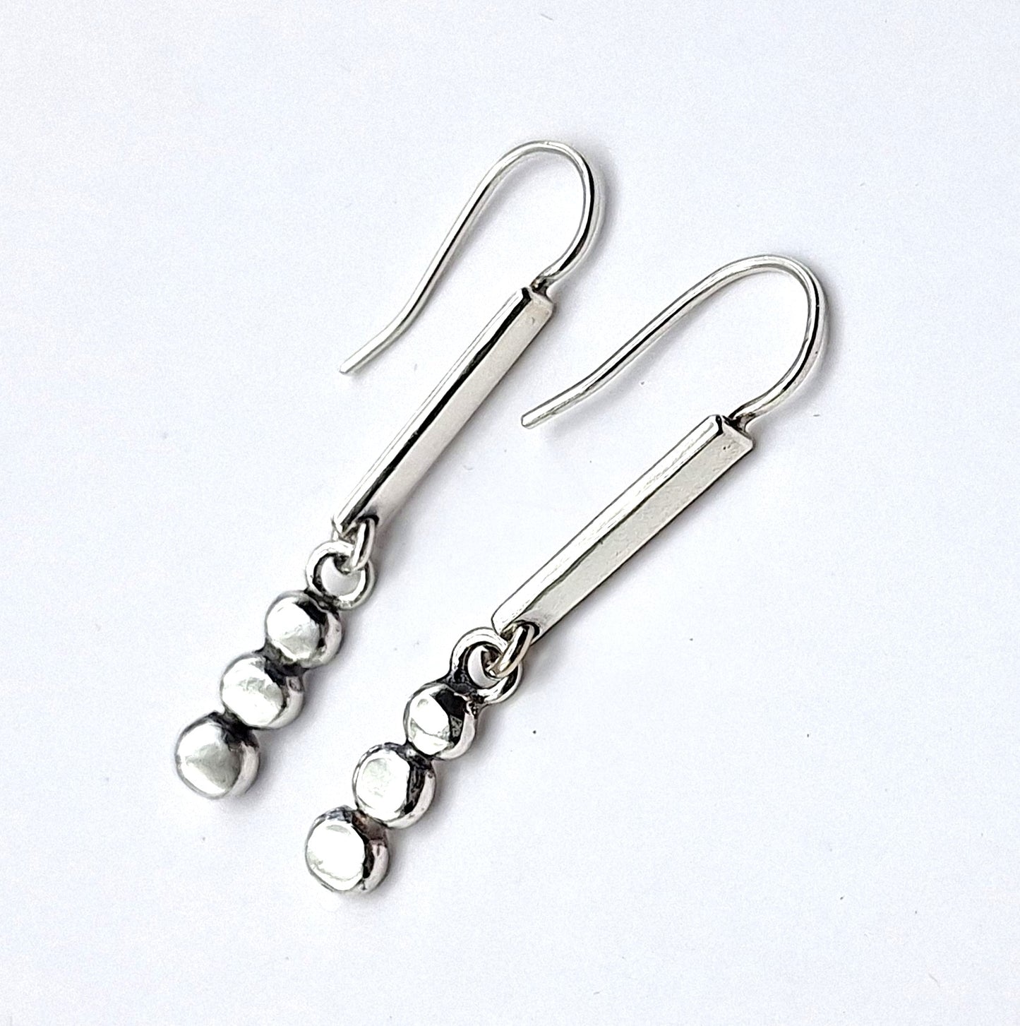 Aros palitos y tachas colgantes