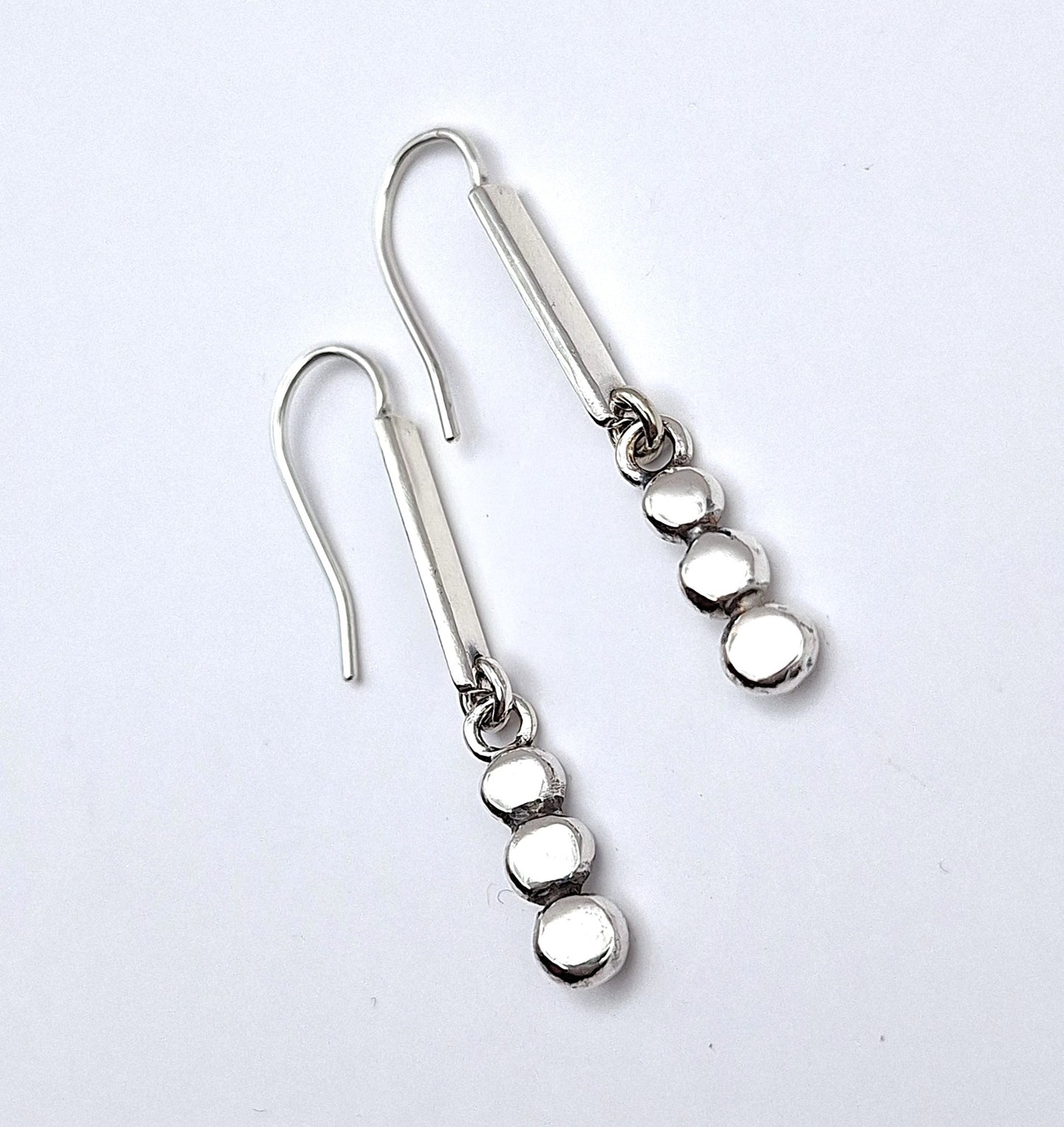 Aros palitos y tachas colgantes